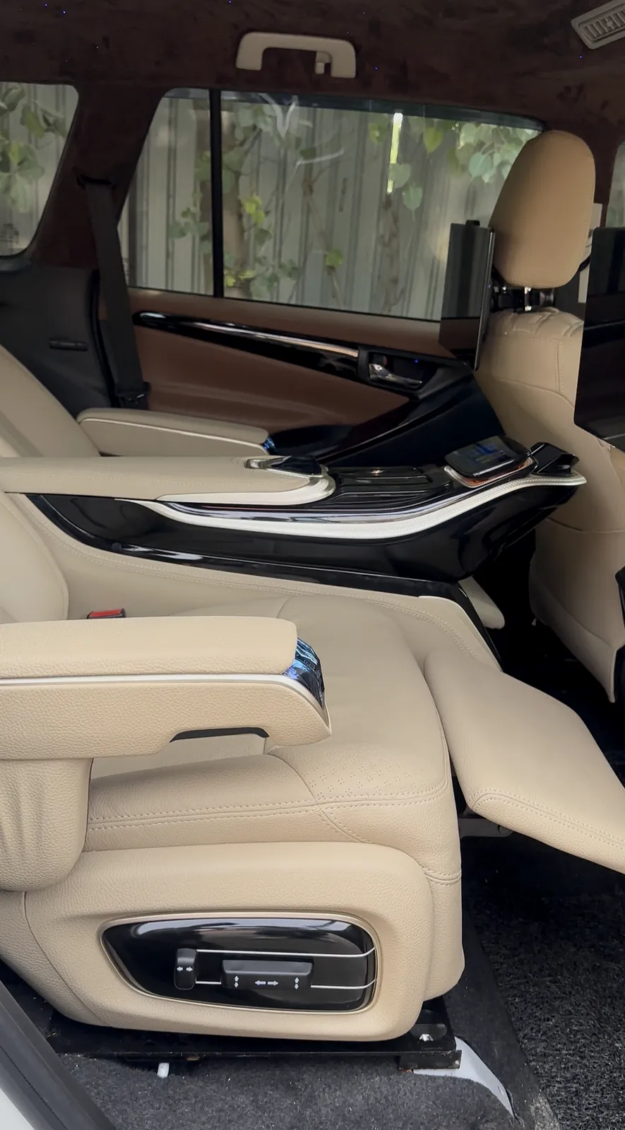 Ivory luxury car makeover with leg rest recliners